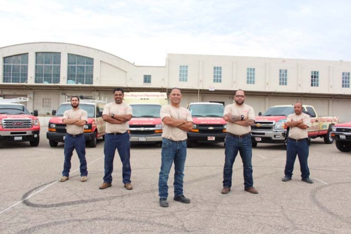 The Original Plumbing Company crew and trucks